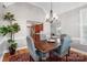 Bright dining room featuring hardwood floors and a view of the kitchen at 1265 Maddy Ln, Rock Hill, SC 29732