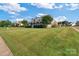 Two-story house with wrap-around porch, stone accents and manicured lawn at 1265 Maddy Ln, Rock Hill, SC 29732