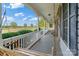 Front porch with wooden swing overlooking a spacious yard at 1265 Maddy Ln, Rock Hill, SC 29732