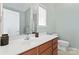 Clean bathroom with single sink vanity and toilet at 135 Singleton Rd, Mooresville, NC 28117