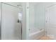 Bathroom with shower and bathtub at 135 Singleton Rd, Mooresville, NC 28117