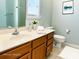 Well lit bathroom featuring a single vanity, updated fixtures and a ceramic tile floor at 135 Singleton Rd, Mooresville, NC 28117