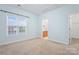 Bedroom featuring an ensuite bathroom and walk-in closet at 135 Singleton Rd, Mooresville, NC 28117
