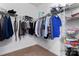 Walk-in closet with shelving and hanging rods at 135 Singleton Rd, Mooresville, NC 28117