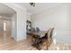 Dining room with hardwood floors and a wooden table at 135 Singleton Rd, Mooresville, NC 28117