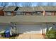 Attached single-car garage with automatic door at 135 Singleton Rd, Mooresville, NC 28117