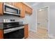 Kitchen featuring stainless steel appliances and an entrance to the laundry room at 135 Singleton Rd, Mooresville, NC 28117