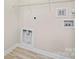 Laundry room featuring washer and dryer hookups and wire shelving at 135 Singleton Rd, Mooresville, NC 28117