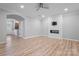 Spacious living room with an electric fireplace and modern fixtures at 135 Singleton Rd, Mooresville, NC 28117