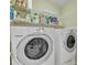 Functional laundry room with front loading washer and dryer, complemented by wire shelving for storage at 153 Snead Rd # 72, Fort Mill, SC 29715