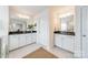 Double vanity bathroom with granite countertops and white cabinets at 172 Longleaf Dr, Mooresville, NC 28117