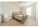 Well-lit bedroom with carpeted floors and a ceiling fan at 172 Longleaf Dr, Mooresville, NC 28117