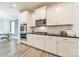 Modern kitchen with stainless steel appliances and white cabinets at 172 Longleaf Dr, Mooresville, NC 28117