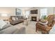 Cozy living room with fireplace and comfortable seating area at 172 Longleaf Dr, Mooresville, NC 28117