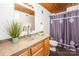 Bathroom with glass sink and pebble floor at 201 S Hoskins Rd # 313, Charlotte, NC 28208