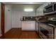 Modern kitchen with stainless steel appliances and granite countertops at 201 S Hoskins Rd # 313, Charlotte, NC 28208