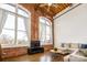 Spacious living room with exposed brick and wood beams at 201 S Hoskins Rd # 313, Charlotte, NC 28208