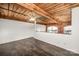 Loft bedroom with exposed beams and high ceilings at 201 S Hoskins Rd # 313, Charlotte, NC 28208