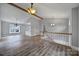 Bright dining area with hardwood floors and chandelier at 204 Swamp Fox Dr, Fort Mill, SC 29715