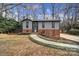 Cute curb appeal with landscaping and a curved walkway at 204 Swamp Fox Dr, Fort Mill, SC 29715