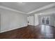 Spacious living room featuring hardwood floors and access to a deck at 204 Swamp Fox Dr, Fort Mill, SC 29715