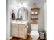 Cozy bathroom with decorative shelving, neutral fixtures, and stylish decor at 2065 Taney Way, Fort Mill, SC 29707