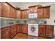 Stylish kitchen features custom cabinetry, granite countertops, and modern appliances at 23234 Kingfisher Dr, Indian Land, SC 29707