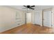 Bright bedroom featuring hardwood floors, neutral walls, and closet at 2357 13Th Street Ne Dr, Hickory, NC 28601