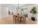 Bright dining area adjacent to the kitchen with hardwood floors and sliding glass doors at 2357 13Th Street Ne Dr, Hickory, NC 28601