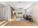 Bright living room with built-in shelving, hardwood floors, and modern furnishings at 2357 13Th Street Ne Dr, Hickory, NC 28601