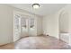 Bright dining area with bay window and tile flooring at 2363 24Th Street Ne Ln, Hickory, NC 28601