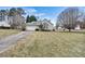 House exterior with a grassy lawn and driveway at 2363 24Th Street Ne Ln, Hickory, NC 28601