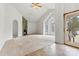 Spacious living room featuring a stone fireplace and large windows at 2363 24Th Street Ne Ln, Hickory, NC 28601