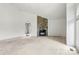 Living room with vaulted ceiling and a stone fireplace at 2363 24Th Street Ne Ln, Hickory, NC 28601