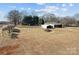 Large storage shed with covered carport area at 2614 S Us 321 Hwy, Newton, NC 28658