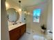 Modern bathroom with walk-in shower, marble vanity, and hexagon tile floor at 2704 Kool Park Ne Rd, Hickory, NC 28601