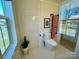 Modern bathroom with toilet, walk-in shower, and hexagon tile floor at 2704 Kool Park Ne Rd, Hickory, NC 28601