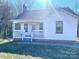 White house with a front porch and small yard at 2704 Kool Park Ne Rd, Hickory, NC 28601