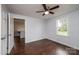 Bedroom with hardwood floors, ceiling fan and access to office at 2752 21St Ne St, Hickory, NC 28601