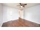 Spacious bedroom with hardwood floors and ceiling fan at 2752 21St Ne St, Hickory, NC 28601