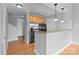 Modern kitchen with stainless steel appliances and light wood cabinets at 301 E Tremont Ave # 313, Charlotte, NC 28203