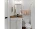 Bathroom with white vanity, gold accents, and neutral color palette at 305 Ideal Way, Charlotte, NC 28203