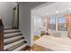 Wooden staircase with grey walls and view of home office at 305 Ideal Way, Charlotte, NC 28203