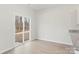 Dining area adjacent to kitchen featuring sliding glass door and luxury vinyl flooring at 3258 Maple Ridge Dr, Gastonia, NC 28052