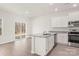 Modern kitchen with stainless appliances, granite countertops and luxury vinyl flooring at 3258 Maple Ridge Dr, Gastonia, NC 28052