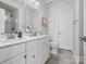 Modern bathroom with double vanity and a walk-in shower at 3731 S Tryon St, Charlotte, NC 28217