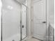 Clean bathroom with a walk-in shower and tiled walls at 3731 S Tryon St, Charlotte, NC 28217