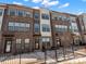 Modern townhome community with brick and gray siding at 3731 S Tryon St, Charlotte, NC 28217