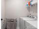 Bright laundry room with washer, dryer, and utility shelving at 5066 Summer Surprise Ln, Charlotte, NC 28215