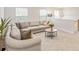 Open living area with sectional sofa and coffee table at 5066 Summer Surprise Ln, Charlotte, NC 28215